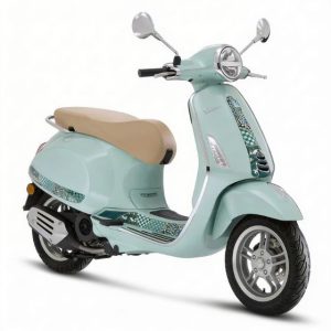 Exclusive Pastel Green Vespa Primavera Batik special edition with traditional exotic patterns and beige saddle, available for rental in Positano - Fratelli Milano.